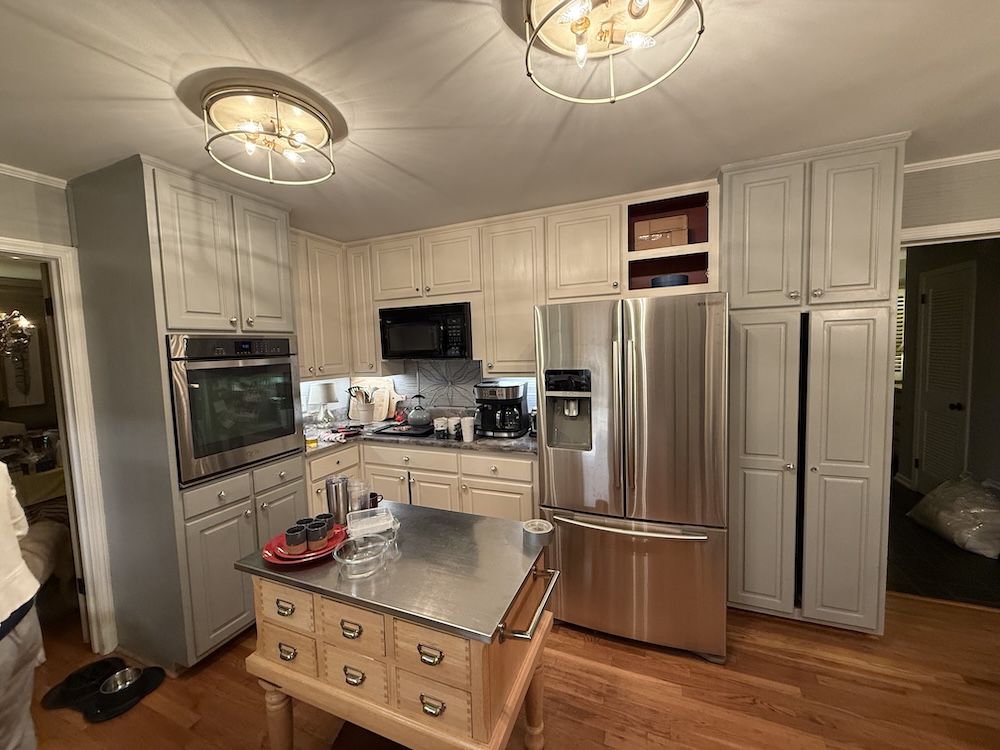 Before photo of the original Atlanta kitchen cabinets prior to refacing project.